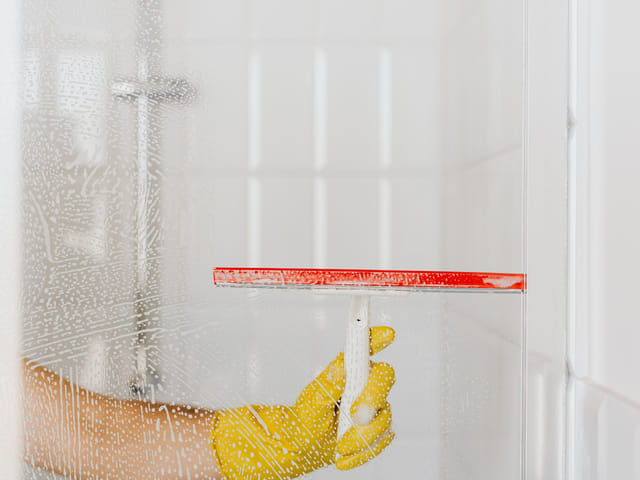 Why the Spots on Your Shower Glass Won't Wipe Off